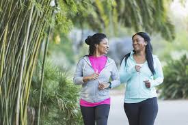 Two African American women jogging together - d-mars.com Houston Black  Business Journal and Directory