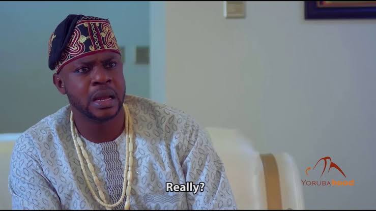 odunlade expressing shock in a scene from a nollywood movie