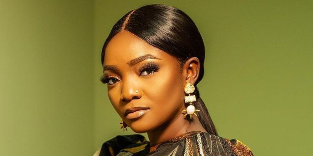 What was Simi's first song?
