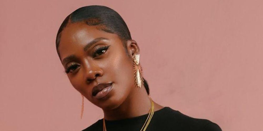 What was Tiwa Savage's first song?